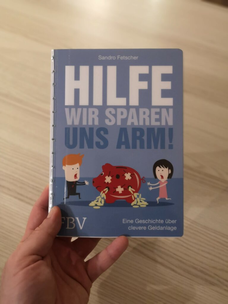 Auf dem Bild ist das Buch Hilfe wir sparen uns arm von vorne zu sehen